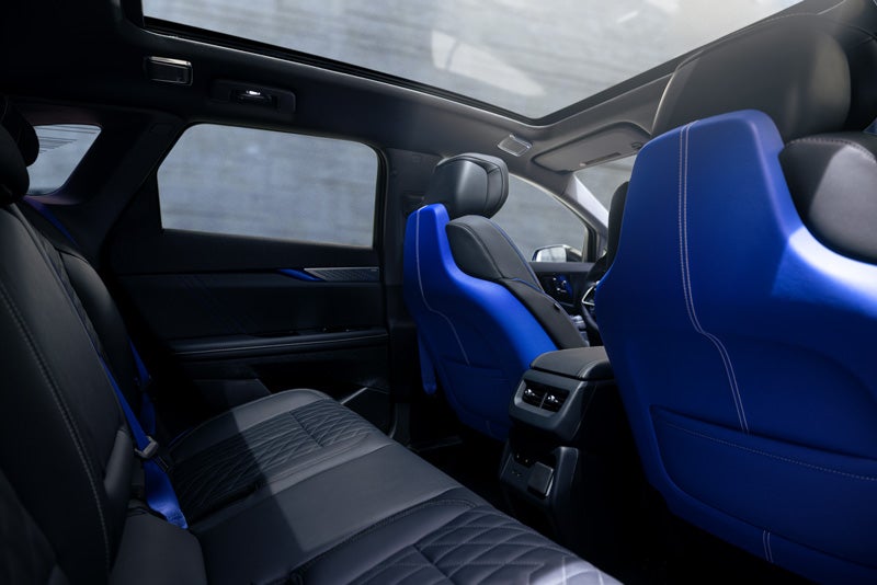 Back Seat View of the 2026 OPTIQ-V Blue Front Seats, Sun Roof, and Interior | Bridgeton Cadillac in Bridgeton NJ